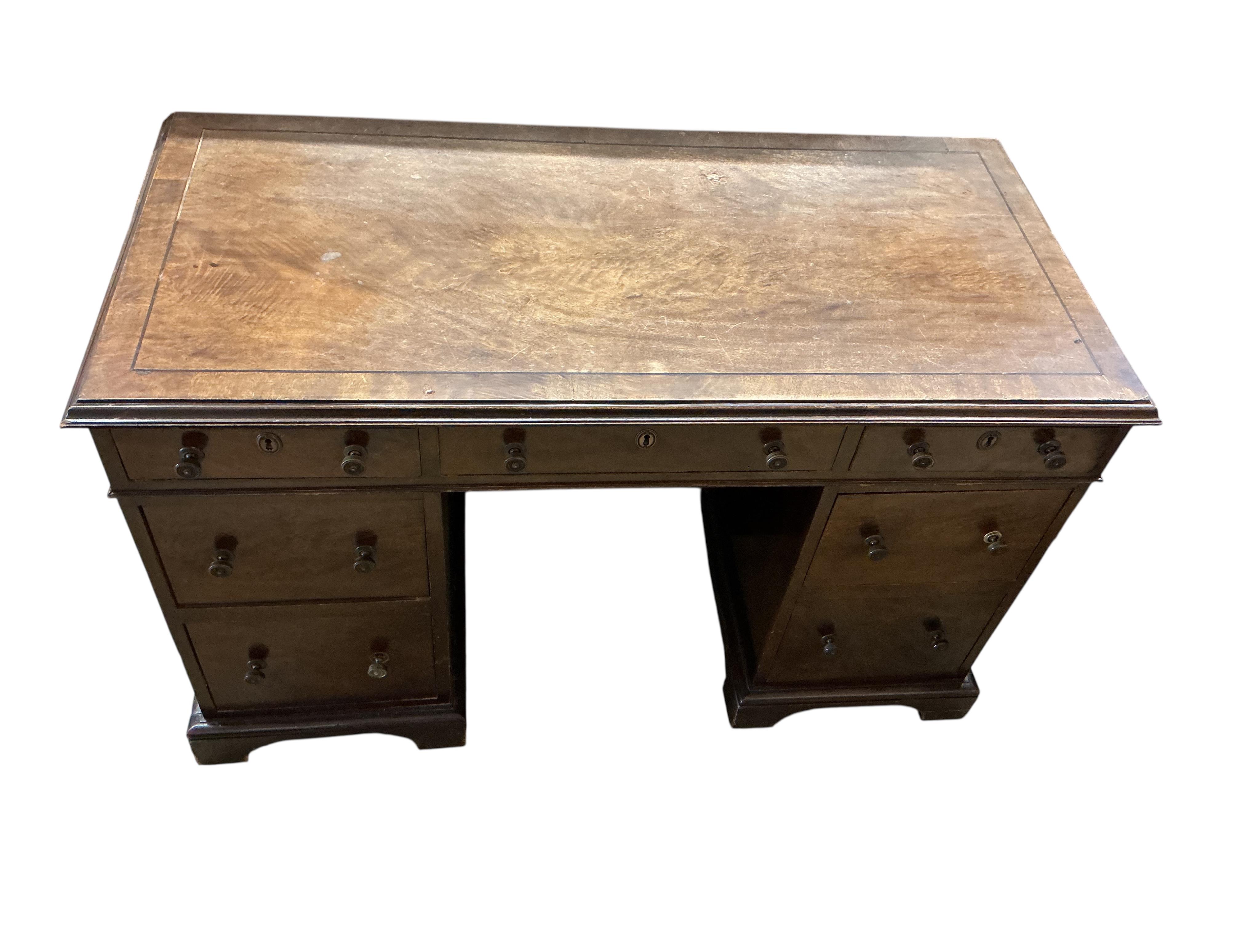 A George III style mahogany pedestal desk, width 122cm, depth 58cm, height 74cm